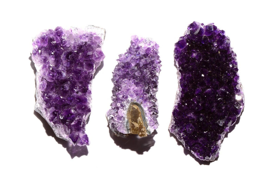 healing crystals: three amethyst geodes