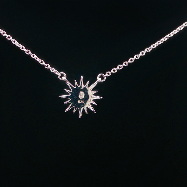 Delicate Sunburst Bell Rock Necklace
