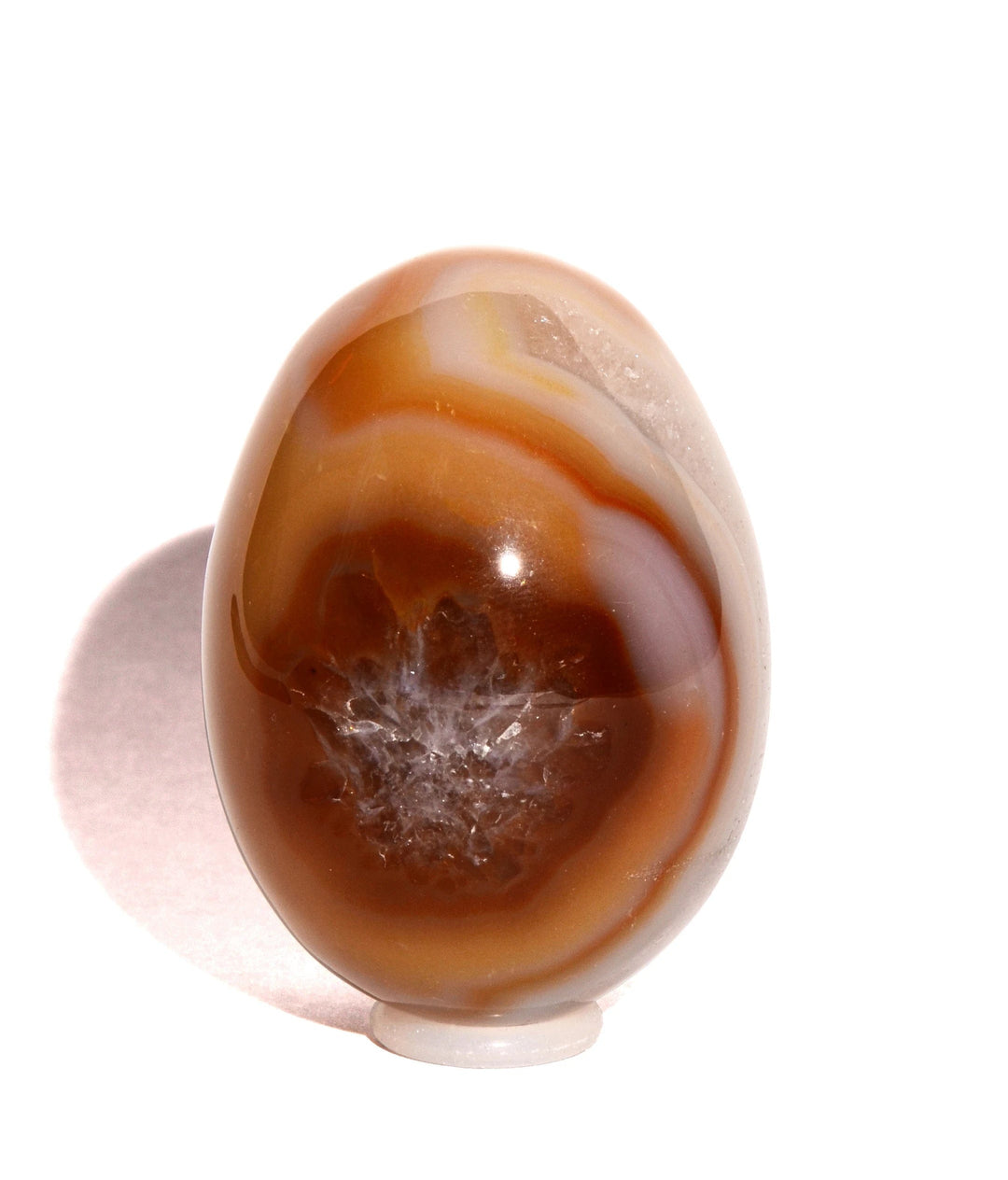 orange and white agate egg