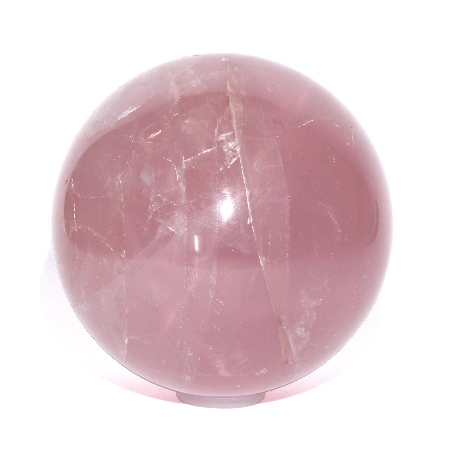 Buy Rose Quartz Sphere for the stone of gentle love.