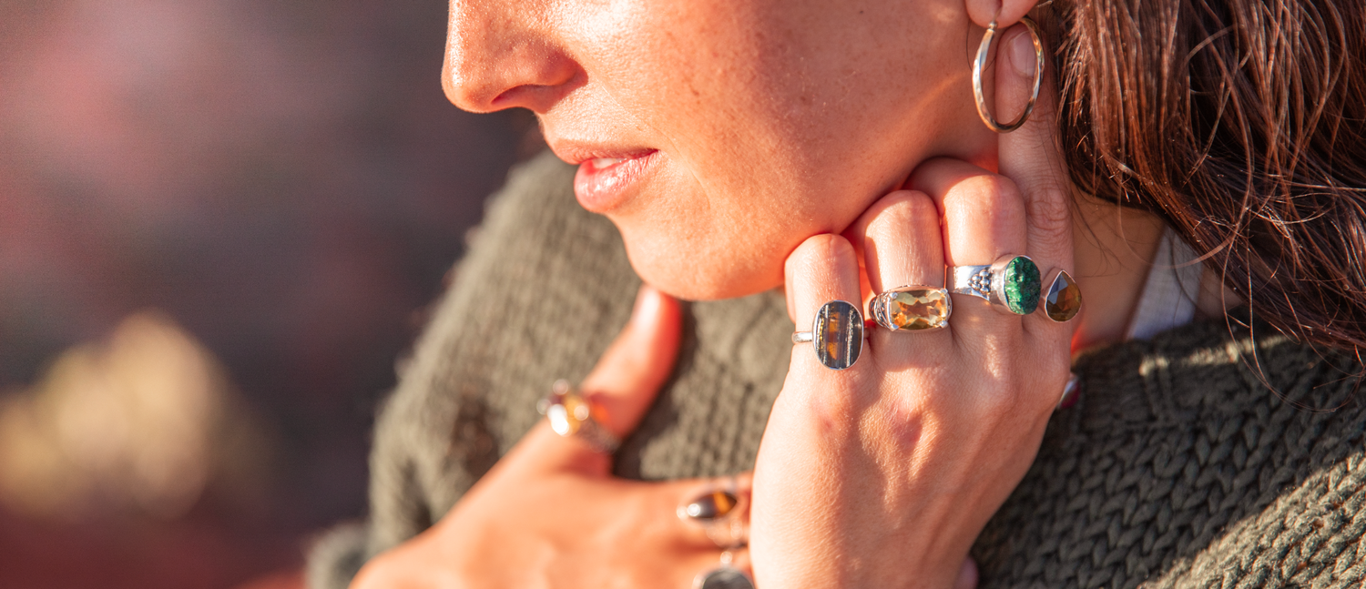 crystal jewelry: woman wearing crystals rings in sedona, arizona