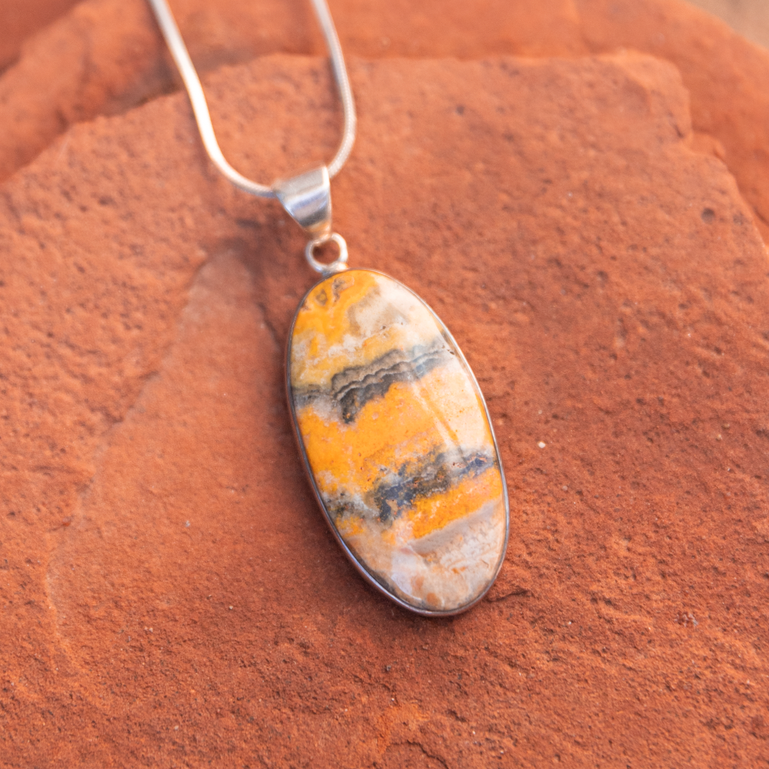 crystal jewelry: bumble bee jasper pendant in sedona, arizona used for energy healing
