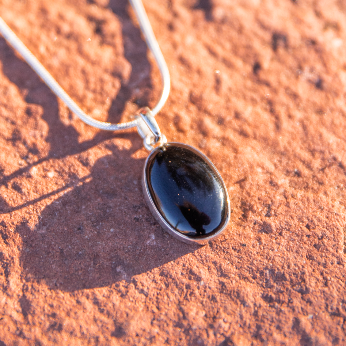 crystal jewelry: onyx pendant in sedona, arizona used for energy healing