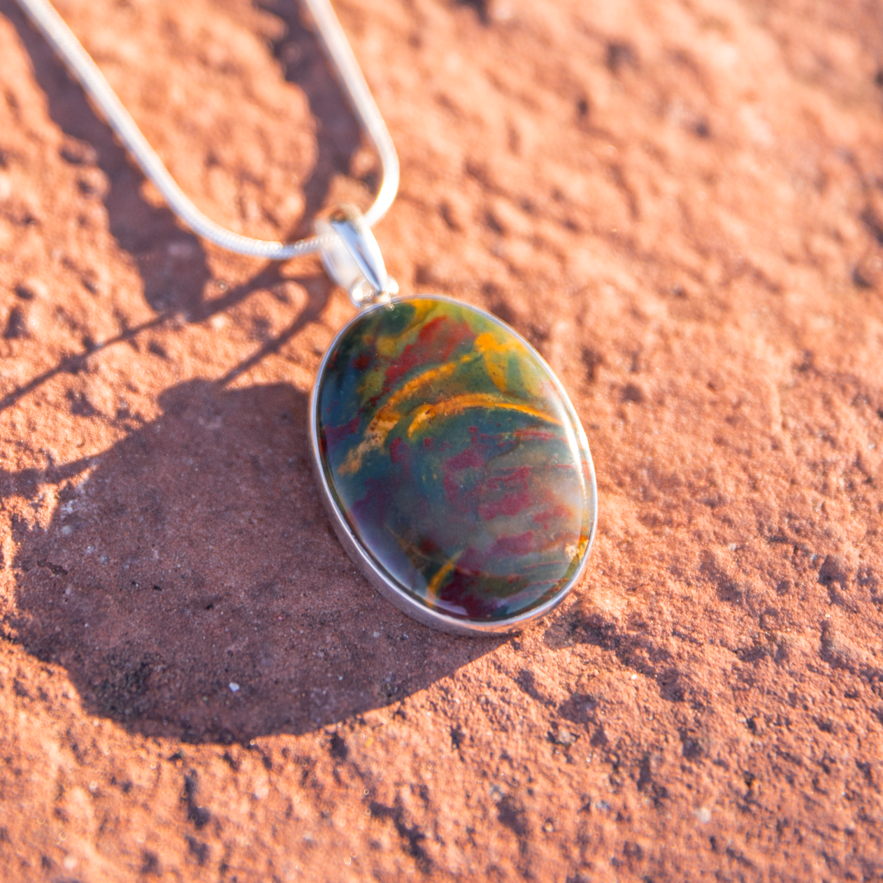 crystal jewelry: bloodstone pendant in sedona, arizona used for energy healing
