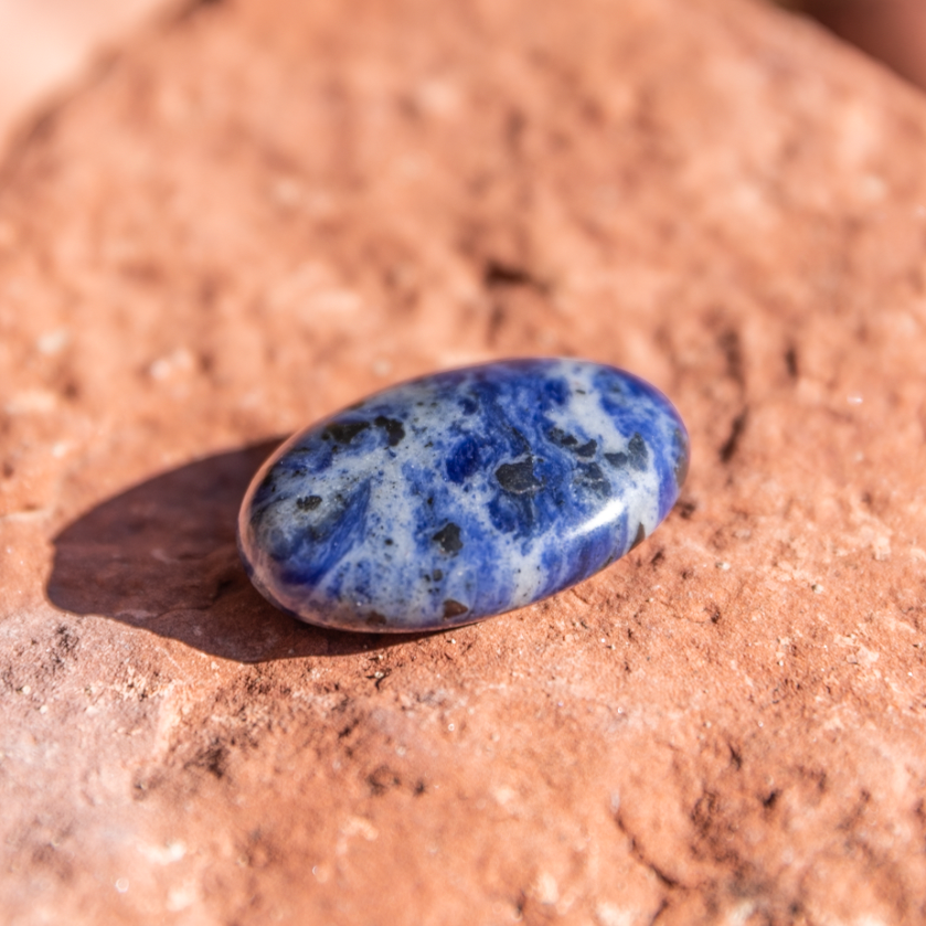 healing crystals: sodalite palm stone in sedona, arizona