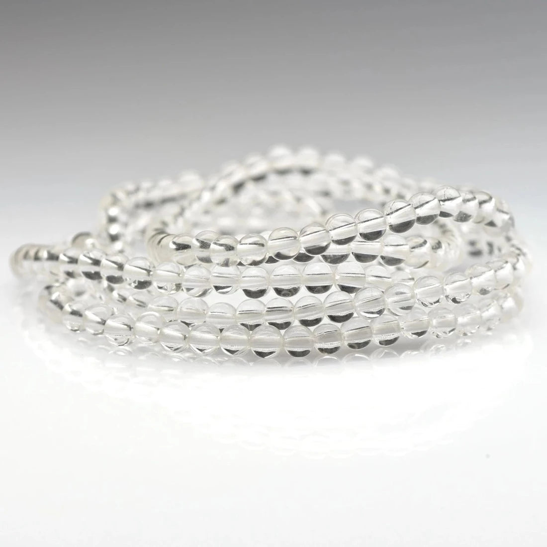 healing crystal jewelry: clear quartz crystal bracelet - small beads